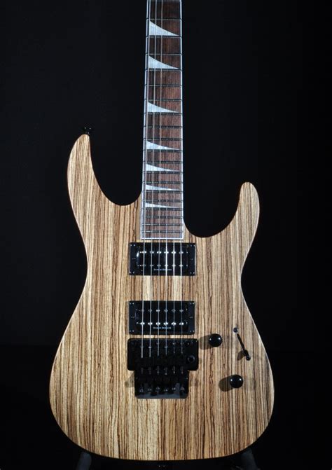 Jackson SLX Soloist Zebra Wood Guitar | StreetSoundsNYC