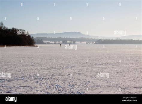 Lake of Menteith frozen over in winter Stock Photo - Alamy