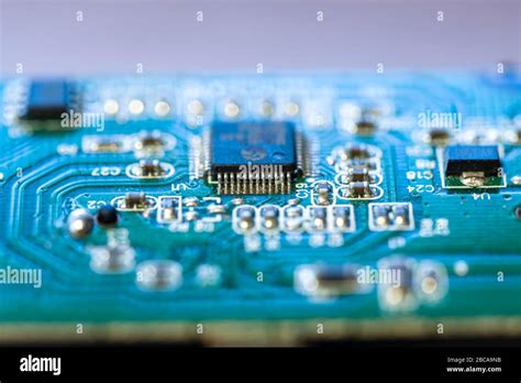 components on green printed circuit board Stock Photo - Alamy