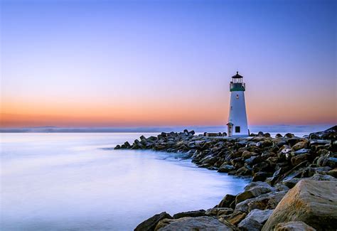 HD wallpaper: Stones, Beach, Lighthouse, Sunset, 5K | Wallpaper Flare