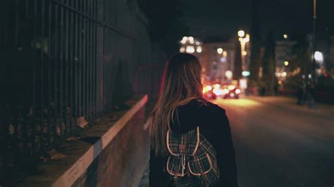 Woman Walking At Night