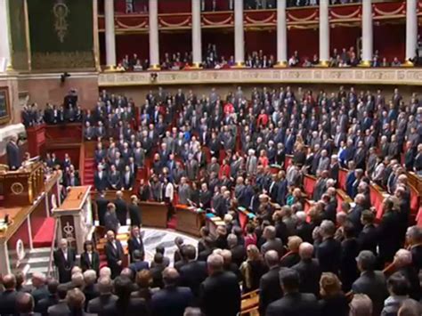 France's National Assembly spontaneously erupts in French anthem during ...