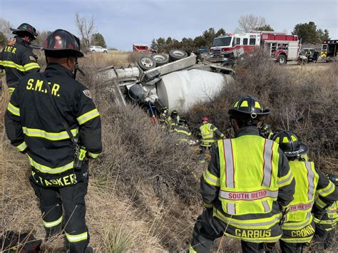 Driver trapped after concrete mixer truck overturns near Parker