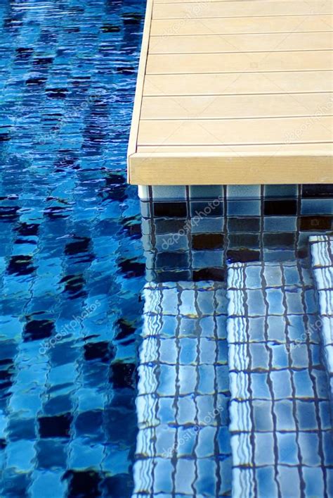 Blue swimming pool tiles — Stock Photo © glowonconcept #34079207