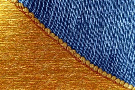 Premium AI Image | Blue and gold fabric texture background