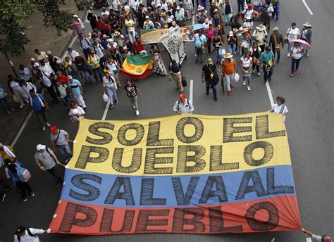 Thousands of Colombians march in Bogota to support government reforms ...