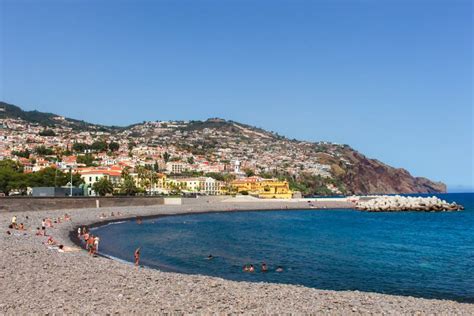 Sunbathers on the Pebble Beach Coast of Funchal, Madeira, Portugal. Editorial Stock Photo ...