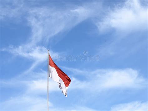 The Merah Putih Flag stock photo. Image of area, cloudscape - 265718240