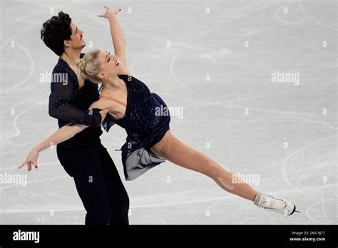 Piper Gilles and Paul Poirier, of Canada, compete in the team ice dance ...