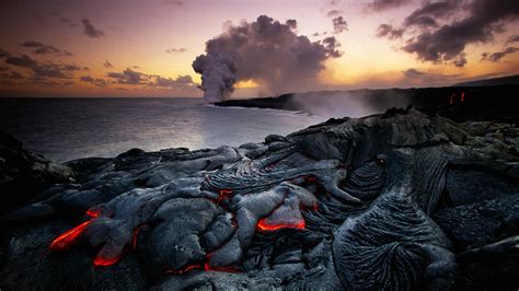 Lava Meets Ocean: An HD Wallpaper of Nature's Fiery Dance