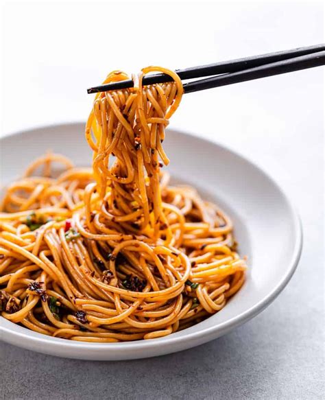 This Spicy Sichuan Noodles with garlic chili oil dish is incredibly delicious! It's the perfect ...