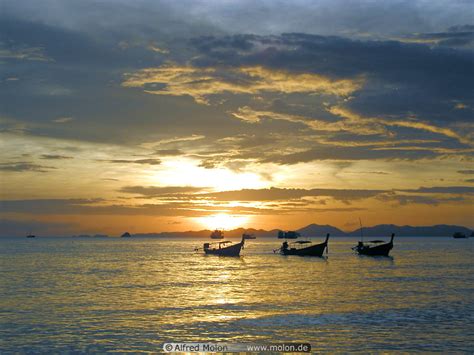 Photo of Sunset on Ao Nang beach. Ao Nang and Nopparat Thara Beaches, Krabi, Thailand