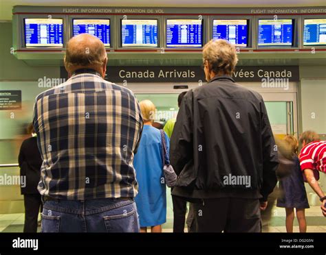 Pearson International Airport arrivals board Toronto Stock Photo - Alamy