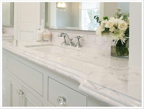 Torquay Quartz by Cambria is made up of a white base with black and ...