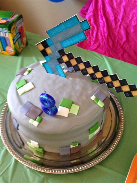 Minecraft emerald ore and diamond pick axe cake. | Minecraft cake, Cake decorating, Cake