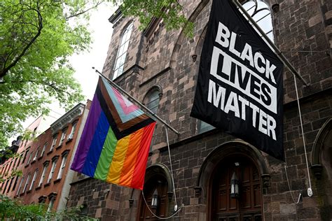 School Banned From Identifying as Catholic After Flying BLM, Pride Flags - Newsweek