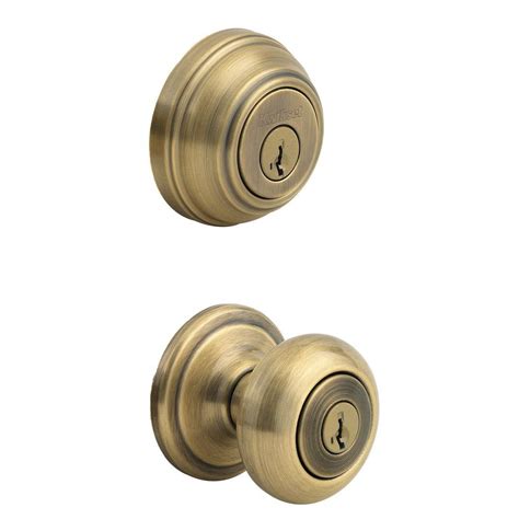 Kwikset Juno Antique Brass Exterior Entry Door Knob and Single Cylinder Deadbolt Combo Pack ...