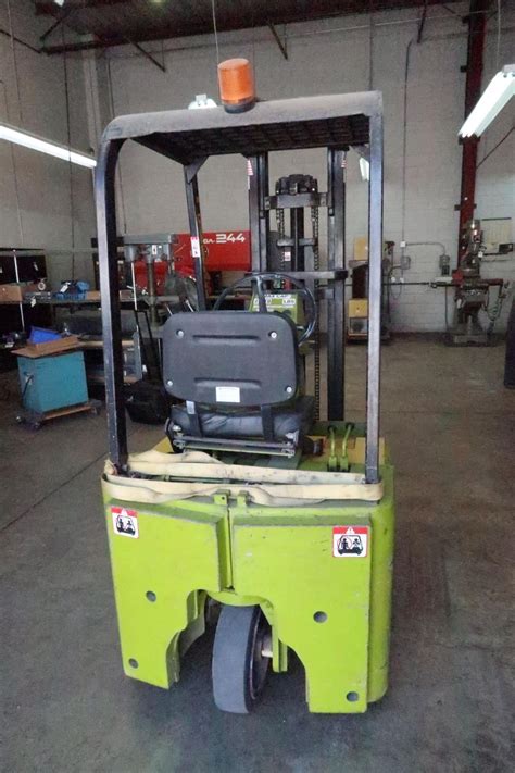 Clark 2500LB Electric Forklift Battery 12H18 w/Charger. This Item is Sold AS IS and NO Warranty A