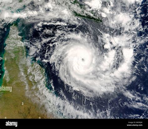 Tropical cyclone Ingrid. Terra satellite image of tropical cyclone Ingrid in the Coral Sea Stock ...