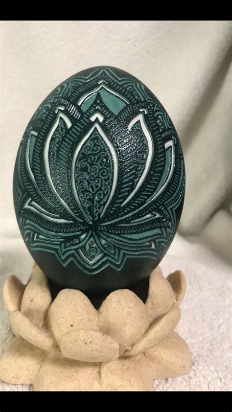 Lotus flower carved into emu shell | Egg shell art, Feather crafts, Egg art