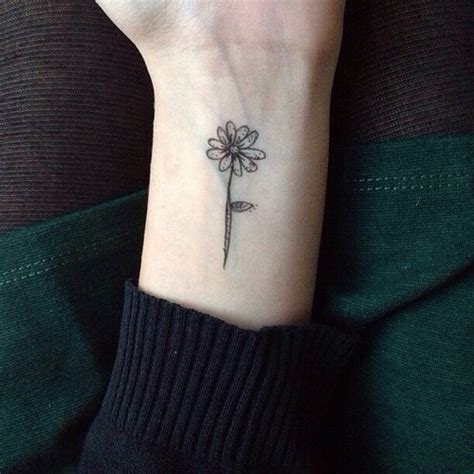 Small Flower Tattoo On Wrist