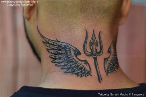 Trishul wings tattoo | trishul shiva tattoo | back neck | Neck tattoo for guys, Back of neck ...