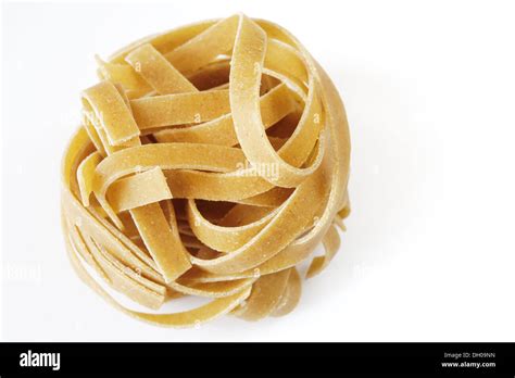 Pasta on a white background Stock Photo - Alamy