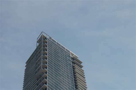 Low Angle Photo of Tower Building during Cloudy Sky · Free Stock Photo