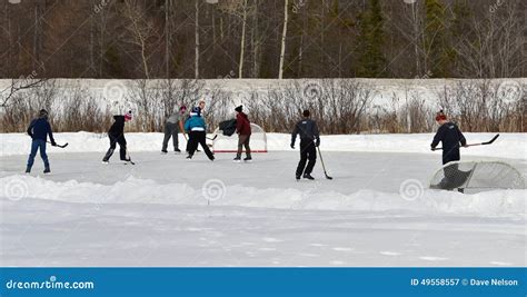 Outdoor ice hockey editorial photography. Image of game - 49558557