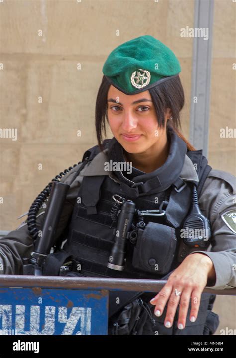 Via Dolorosa Jerusalem Israel A friendly young Israeli policeman and woman pose for photographs ...