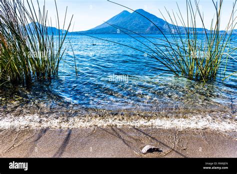 Atitlan & Toliman volcanoes on Lake Atitlan in Guatemalan highlands ...