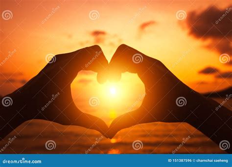 Hands Forming a Heart Shape with Sunset Silhouette Stock Photo - Image ...