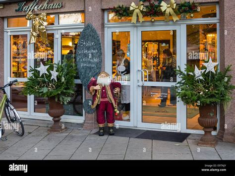 Coffee shop entrance, festive Christmas decorations, Germany Stock ...