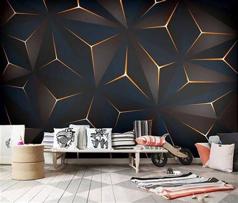 a living room with black and gold wallpaper