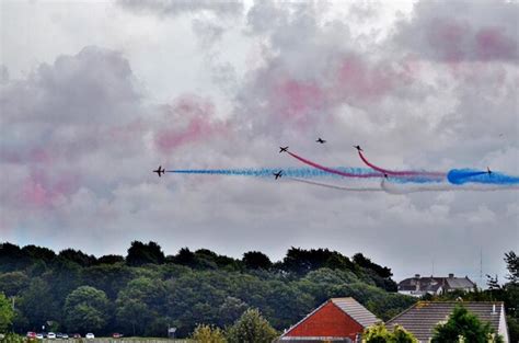 Premium Photo | Airplanes with vapor trail in sky during airshow