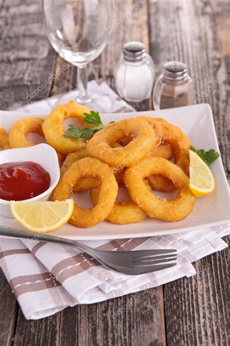 Fried calamari rings — Stock Photo © studioM #64848149