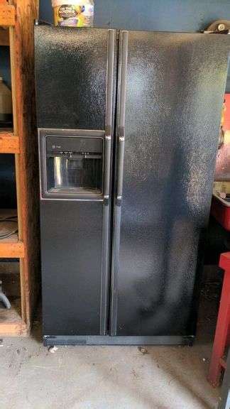 GE Profile Refrigerator - Aumann Auctions, Inc.