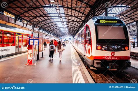 Tourists and InterRegio Trains at Lucerne Station, Switzerland Editorial Stock Image - Image of ...