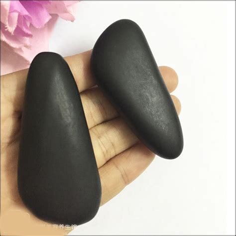 Quality 2 pcs natural volcanic energy massage stone spa stone for face palm and hand joints foot ...