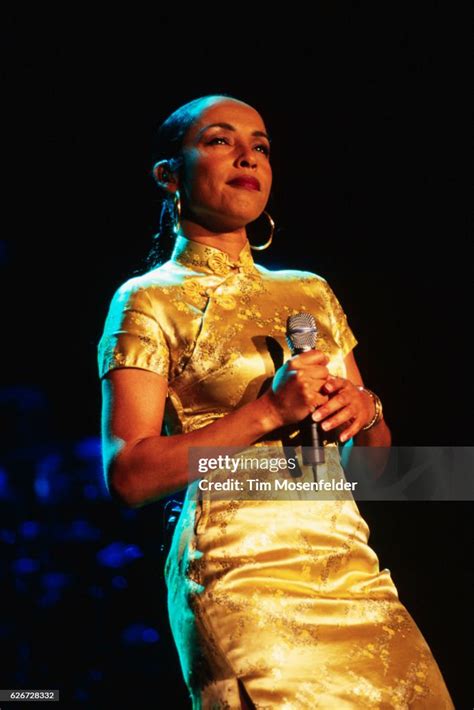 Sade performs on stage. Sade is out now on her first tour in nearly ...