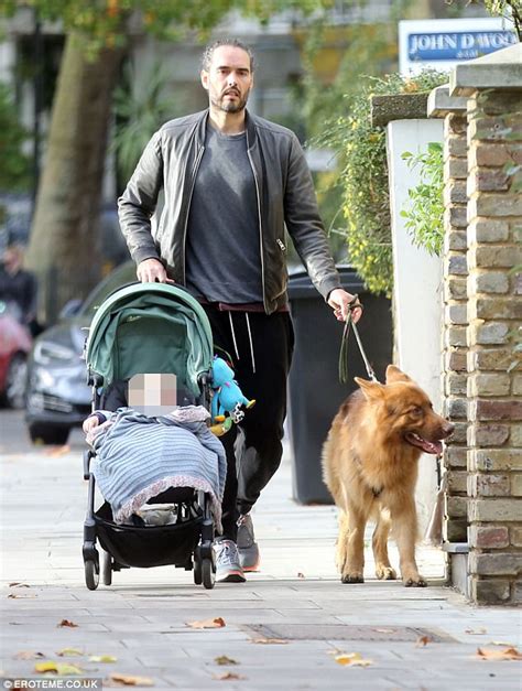 Russell Brand enjoys a stroll with 10-month-old daughter | Daily Mail Online