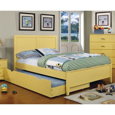 a yellow bed frame with drawers underneath it