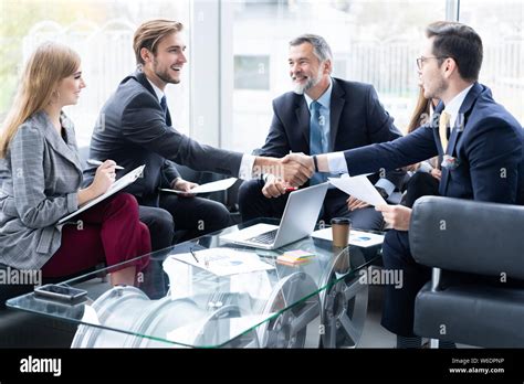 Business people shaking hands, finishing up a meeting. Handshake. Business concept Stock Photo ...