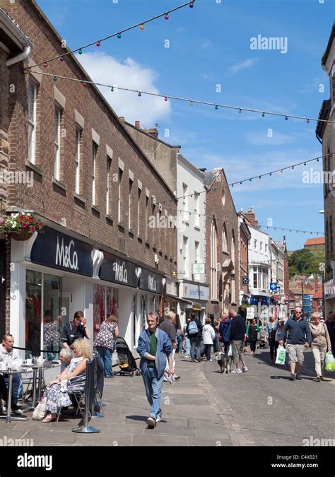 Baxtergate a pedestrianised Shopping street in Whitby Town Centre North Yorkshire England Stock ...