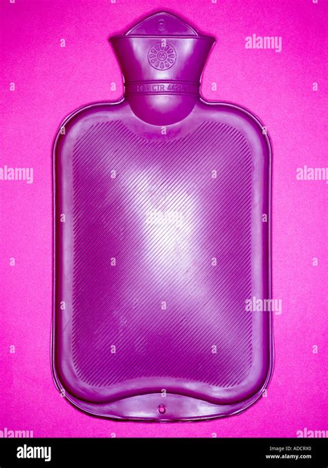 purple hot water bottle Stock Photo - Alamy