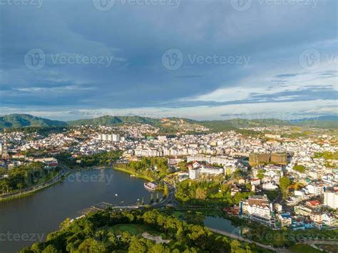 Aerial view of a Da Lat City with development buildings, transportation. Tourist city in ...