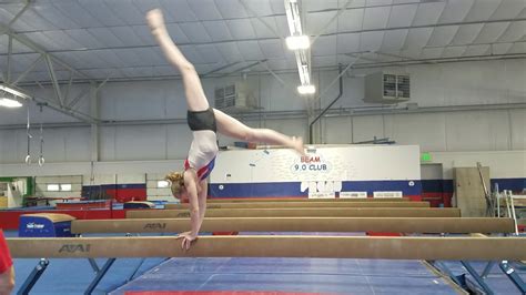 Back walkover on high beam - YouTube