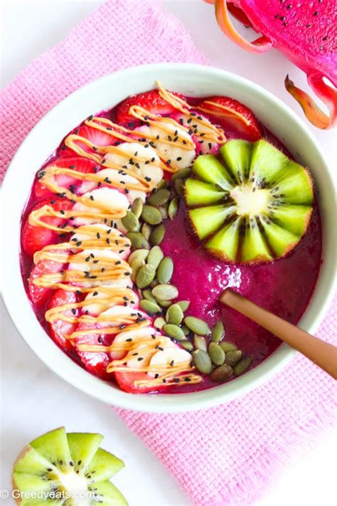 Dragon fruit smoothie bowl with kiwi, strawberry and seeds