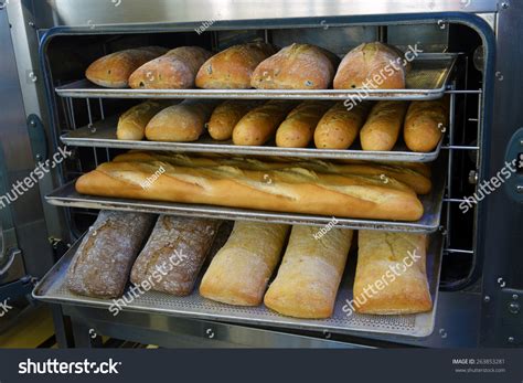 Loaf Of Freshly Baked Bread From The Oven In A Modern Bakery Stock Photo 263853281 : Shutterstock