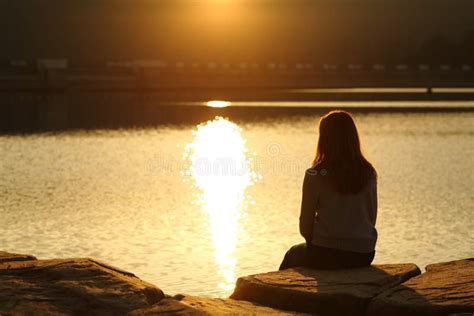 Woman Silhouette Contemplating Sunset in a Lake Stock Image - Image of nature, dream: 239103487